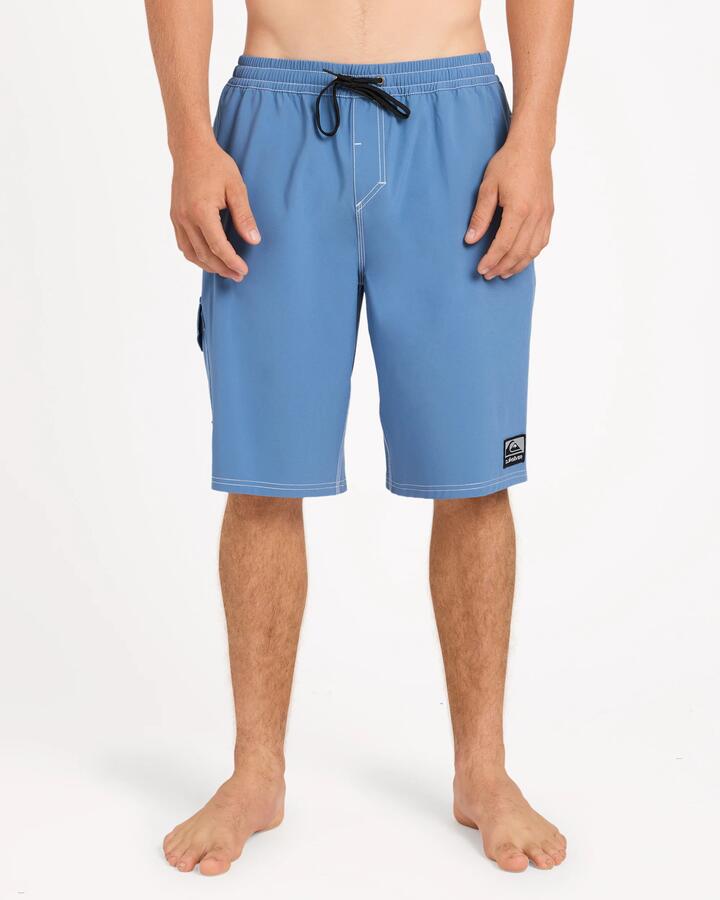 Image of a model wearing Shorts. Product name - Quiksilver Mens Exhibit 21" Volley Shorts Blue Horizon in Blue Horizon colour by brand - Quiksilver