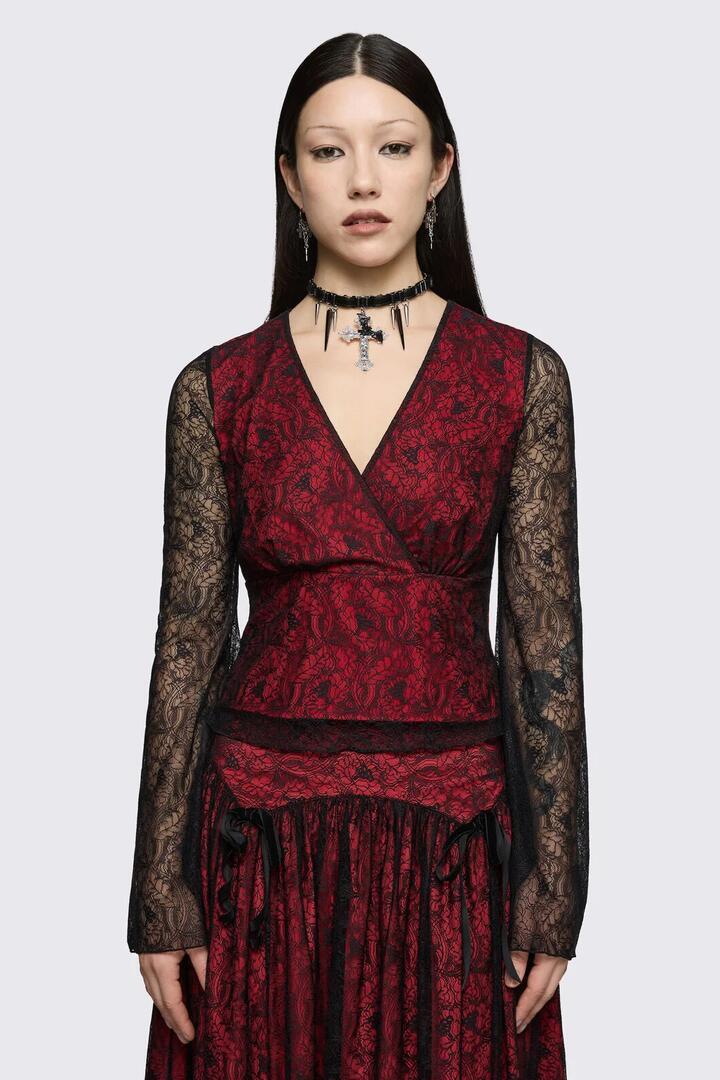 Image of a model wearing Tops. Product name - Sunday Lace Top in Black Red colour by brand - Black Friday