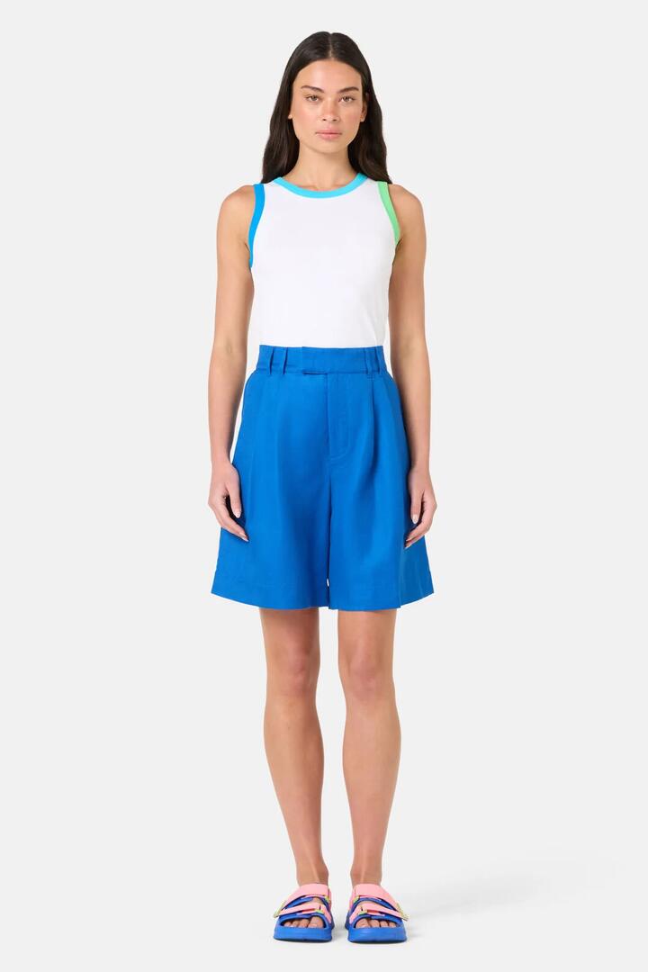Image of a model wearing Shorts. Product name - Mylie Tailored Shorts in Blue colour by brand - Gorman