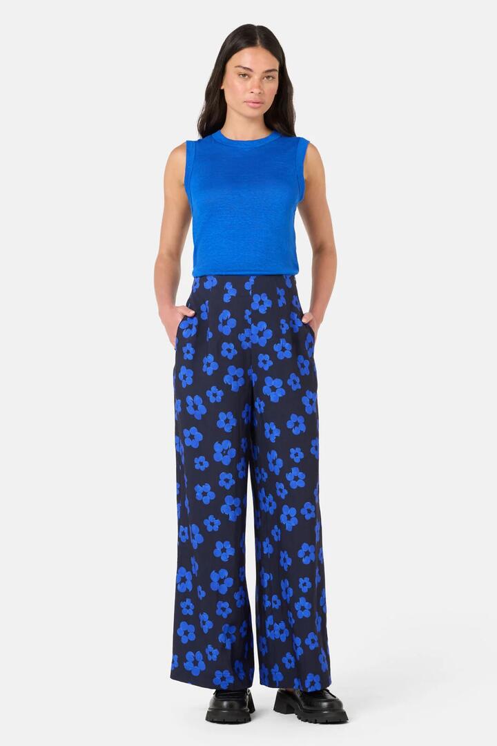 Image of a model wearing Pants. Product name - Salon Flower Pants in Print colour by brand - Gorman