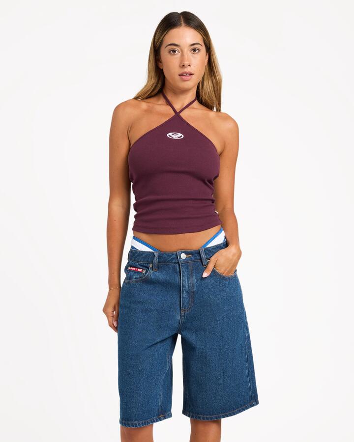 Image of a model wearing Shorts. Product name - Roxy Womens Sugar Loaf Denim Shorts Blue in Blue colour by brand - Roxy
