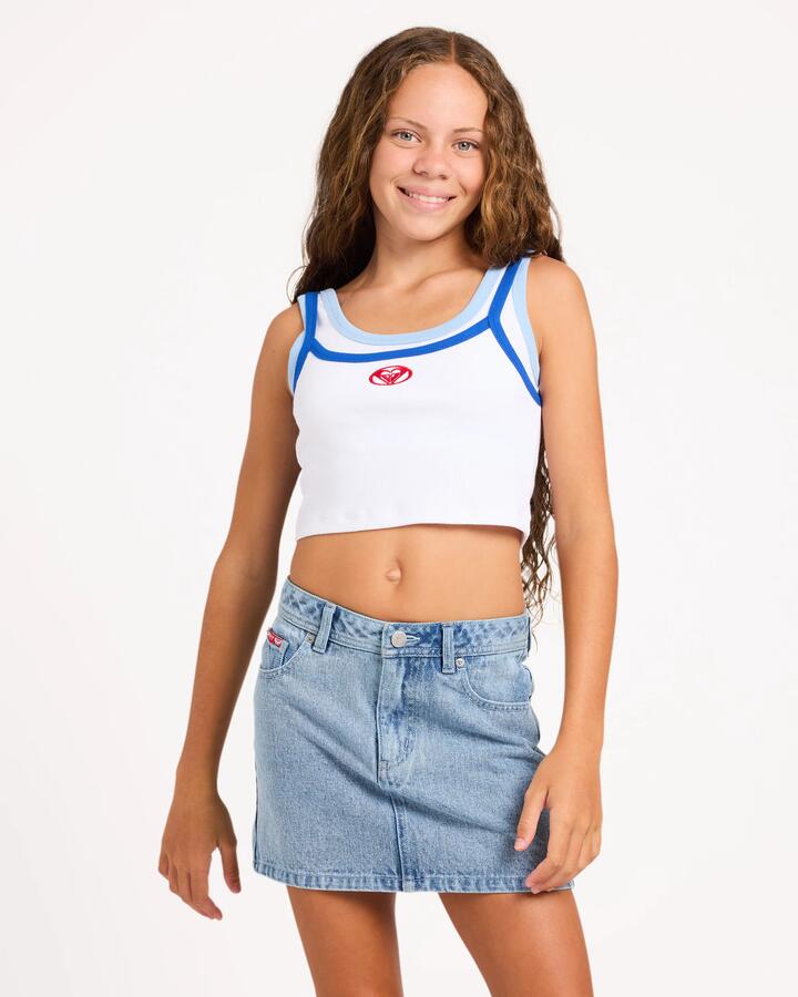 Image of a model wearing Skirts. Product name - Roxy Girls 8-16 Backslider Denim Mini Skirt Light Blue in Light Blue colour by brand - Roxy