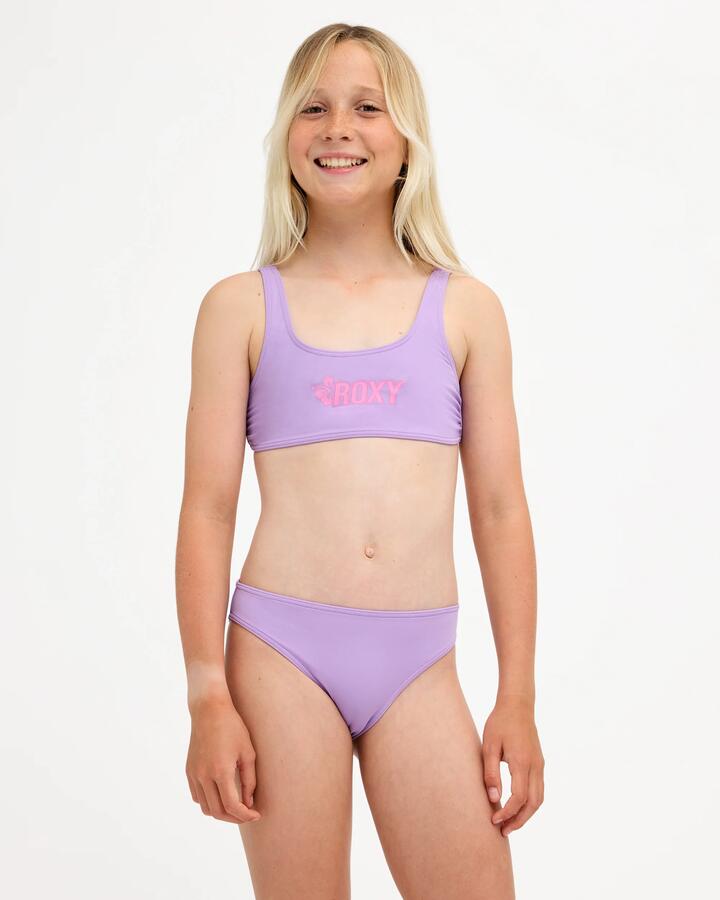 Image of a model wearing Tops. Product name - Roxy Girls 8-16 Shore Swell Bralette Two Piece Viola in Viola colour by brand - Roxy