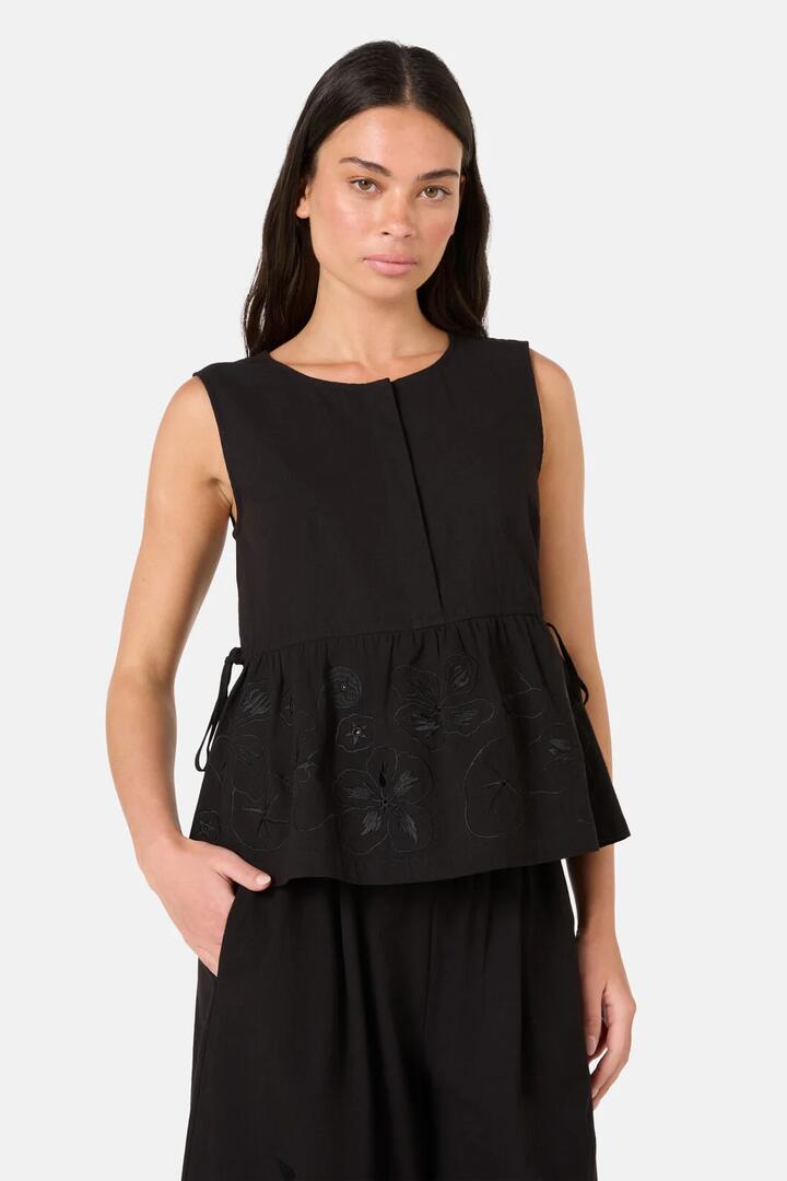 Image of a model wearing Tops. Product name - Annie Anglaise Cotton Tank in Black colour by brand - Gorman