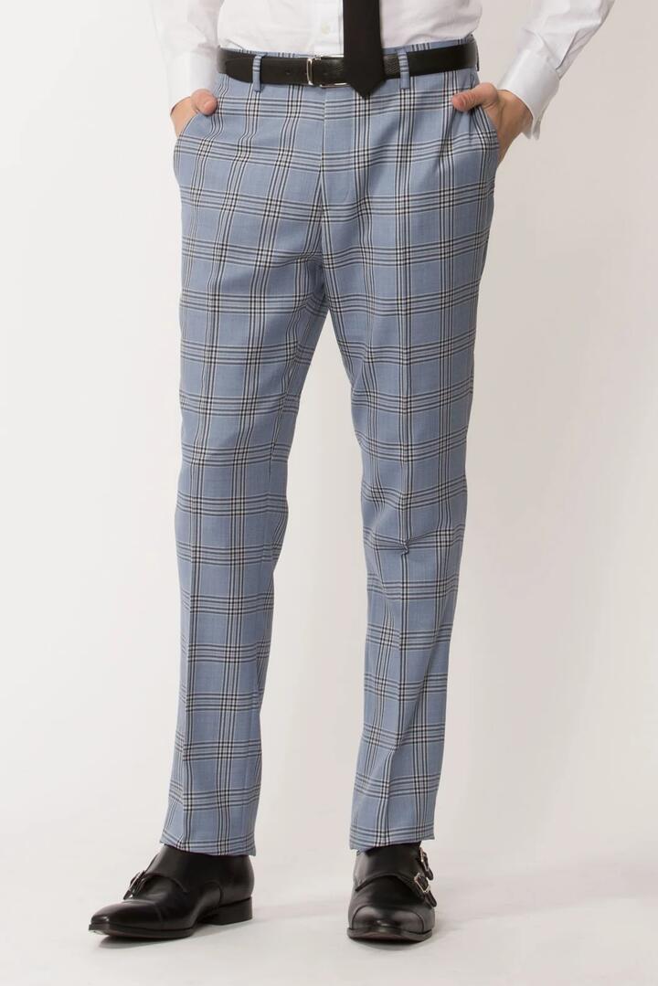 Image of a model wearing Pants. Product name - Flash Suit Pant in Pale Blue colour by brand - Jack London