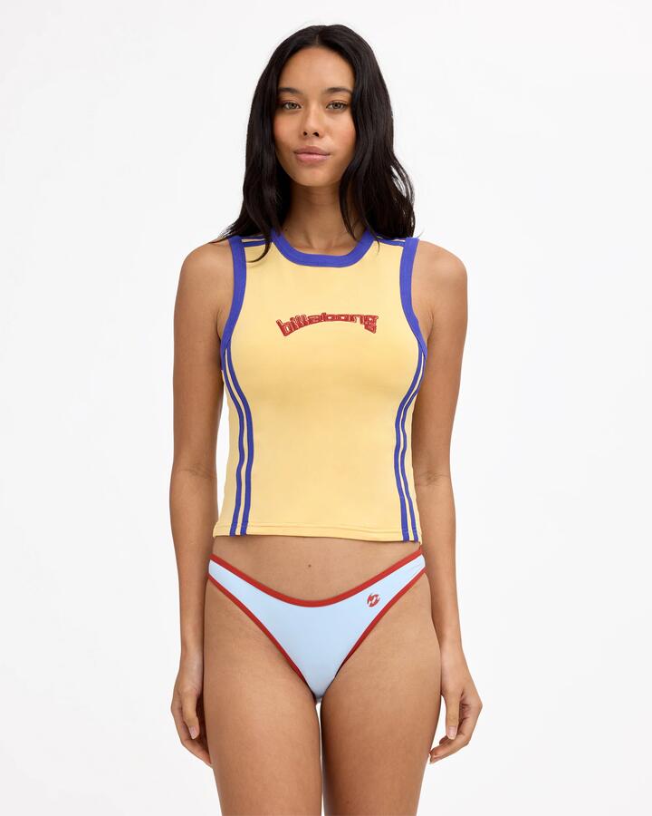 Image of a model wearing Tops. Product name - Billabong Womens Dig It Tank Top Sunbeam in Sunbeam colour by brand - Billabong