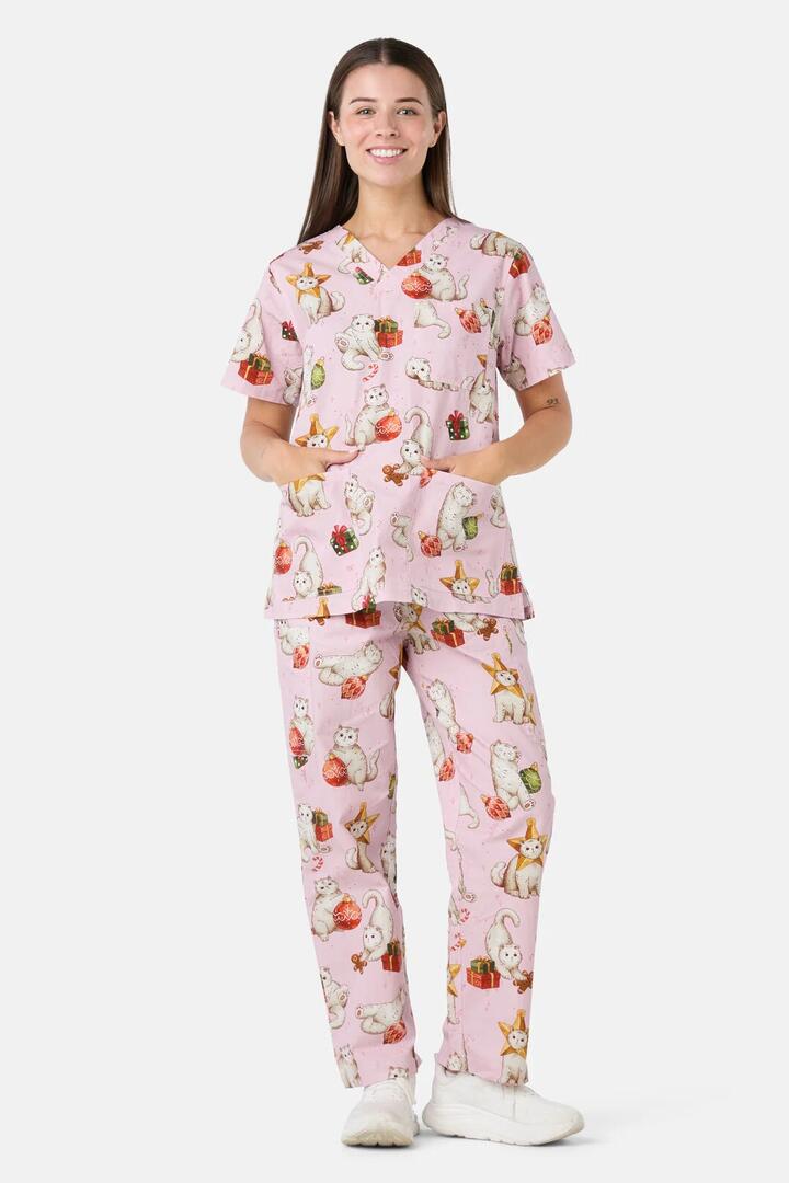Image of a model wearing Uniforms & Workwear. Product name - Gift Cats Scrub Set in Pink colour by brand - Scrubs With Love