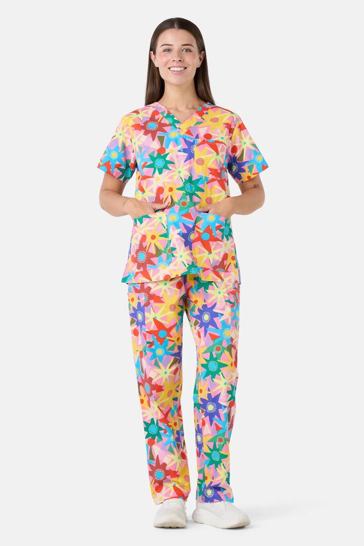 Image of a model wearing Uniforms & Workwear. Product name - Starlight Sorbet Scrub Set in Pink colour by brand - Gorman
