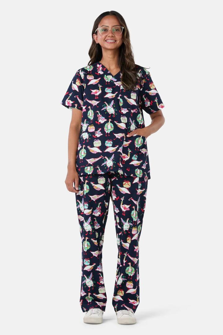 Image of a model wearing Uniforms & Workwear. Product name - Christmas Goose Scrub Set in Navy colour by brand - Gorman