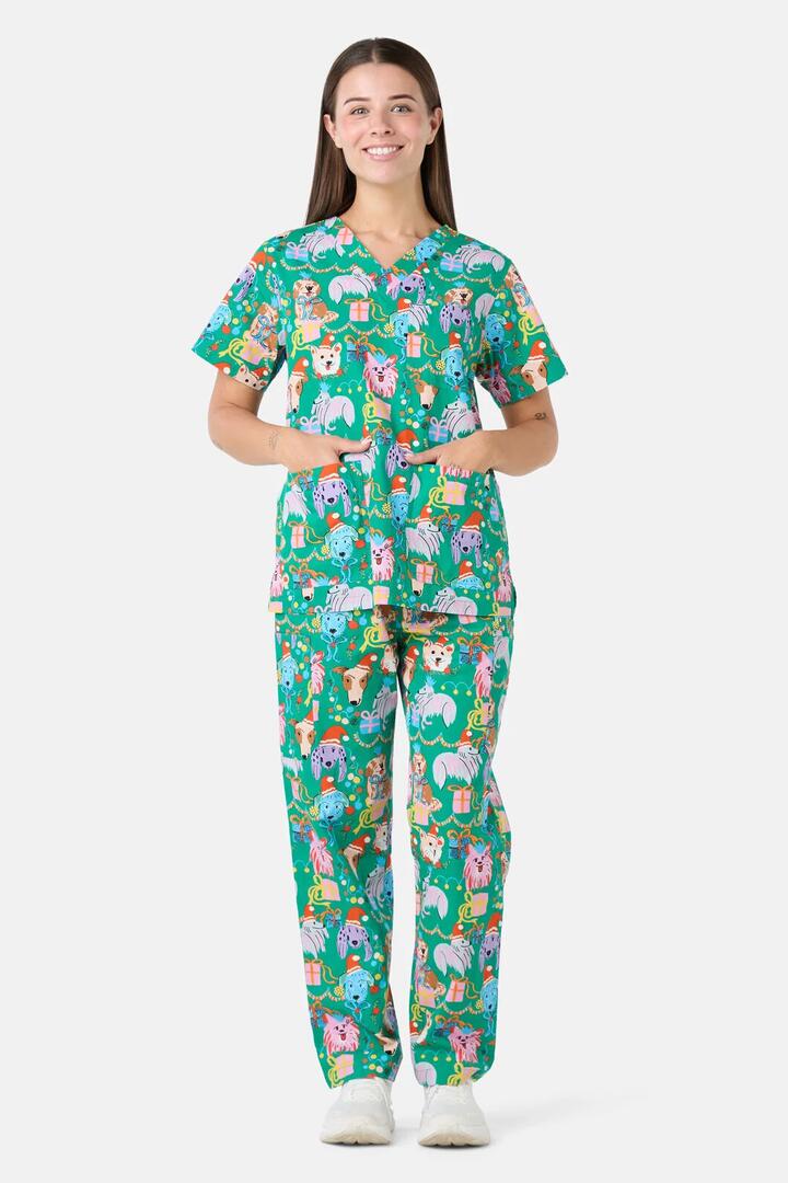 Image of a model wearing Uniforms & Workwear. Product name - Santa Paws Scrub Set in Green colour by brand - Gorman