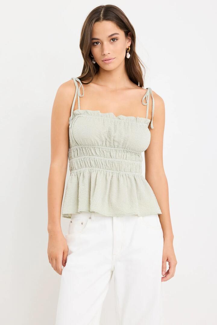 Image of a model wearing Tops. Product name - Musings Sage Gingham Tie Strap Cami in Sage Gingham colour by brand - Among the Brave