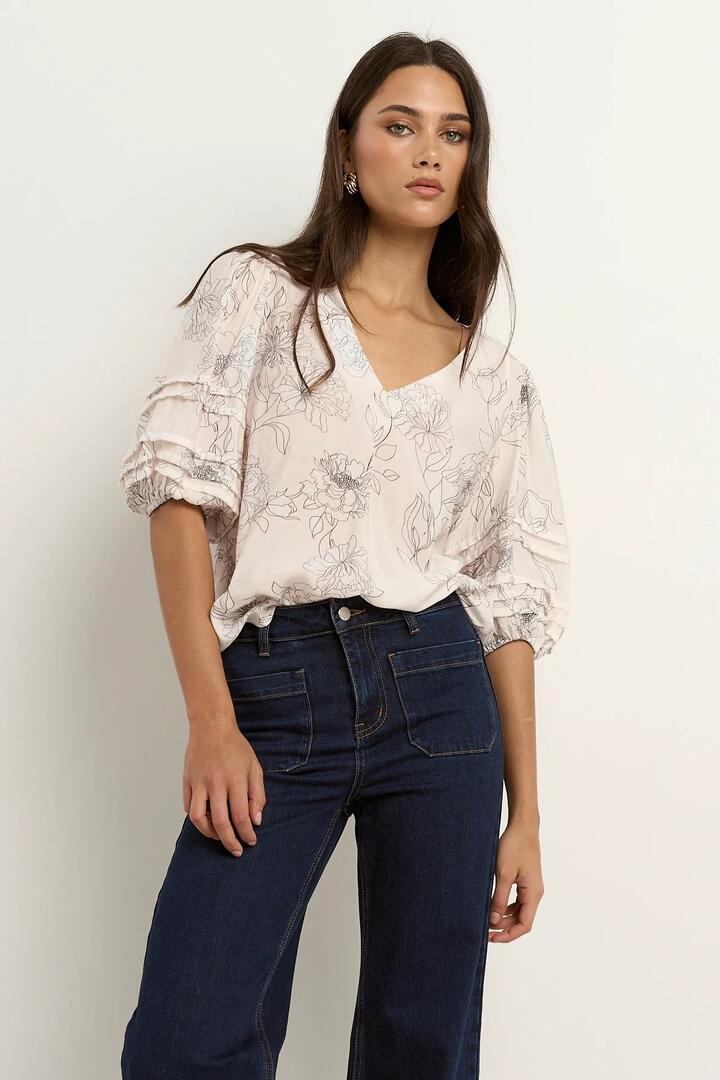 Image of a model wearing Tops. Product name - Recall Ivory Sketch Floral Pleat Sleeve Crew Top in Ivory Sketch Floral colour by brand - Ivy + Jack