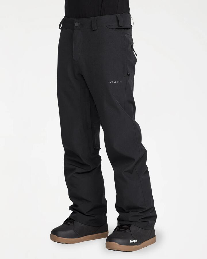 Image of a model wearing Pants. Product name - Volcom Mens Frkn Snow Chino Pants Black in Black colour by brand - Volcom