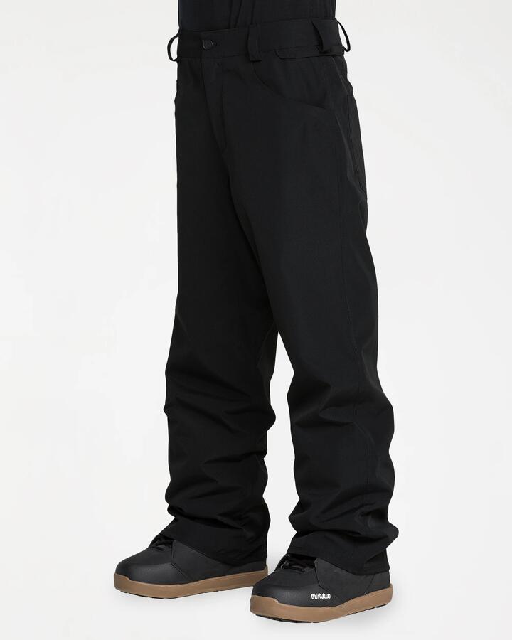 Image of a model wearing Pants. Product name - Volcom Mens Nailer Pants Black in Black colour by brand - Volcom