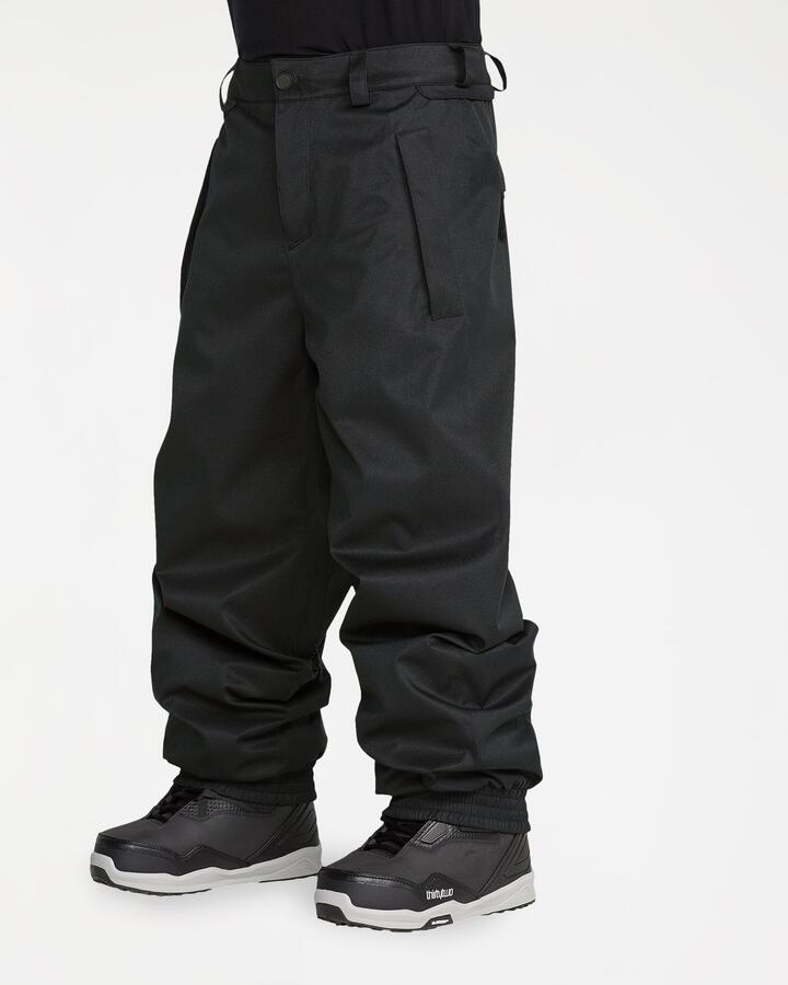 Image of a model wearing Pants. Product name - Volcom Mens Arthur 20K Pants Black in Black colour by brand - Volcom