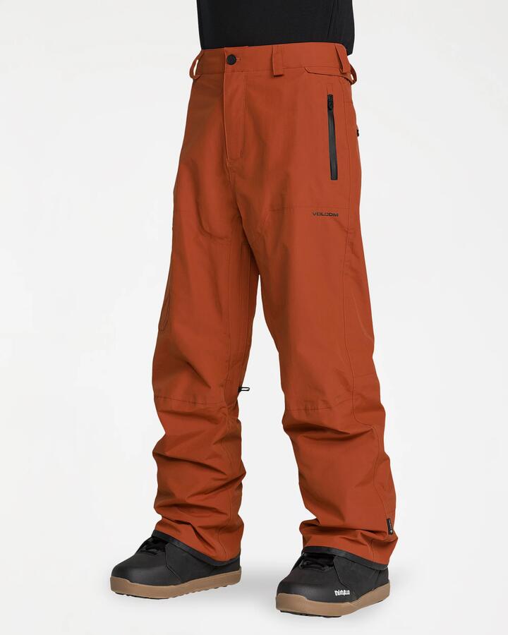 Image of a model wearing Pants. Product name - Volcom Mens L Gore-Tex Pants Burnt Orange in Burnt Orange colour by brand - Volcom