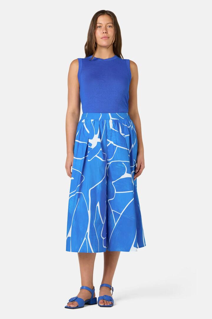 Image of a model wearing Skirts. Product name - Blue Nude Cotton Skort in Print colour by brand - Gorman