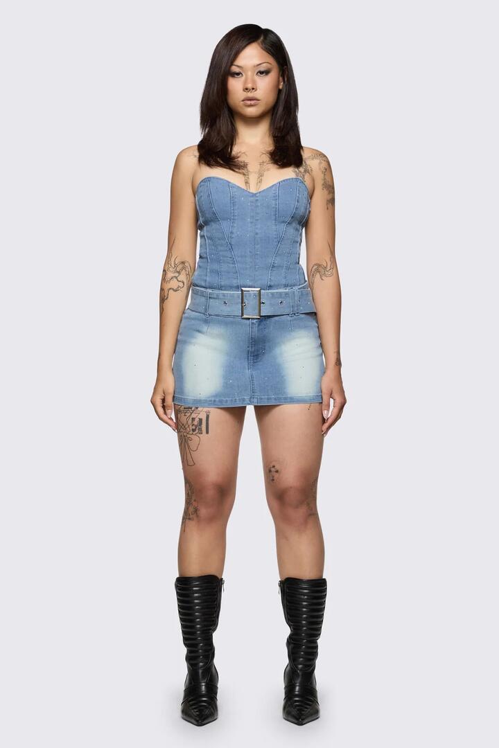 Image of a model wearing Skirts. Product name - Broken Rollercoaster Micro Skort in Blue colour by brand - Dangerfield