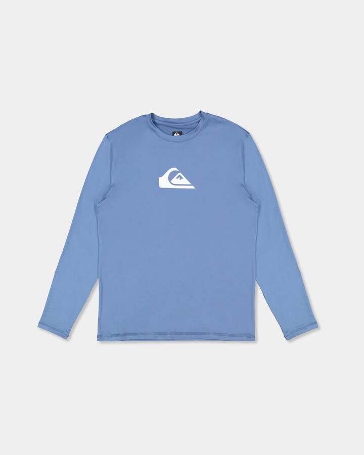 Image of a model wearing Tops. Product name - Quiksilver Mens Solid Streak Long Sleeve Surf Shirt Quiet Harbor in Quiet Harbor colour by brand - Quiksilver