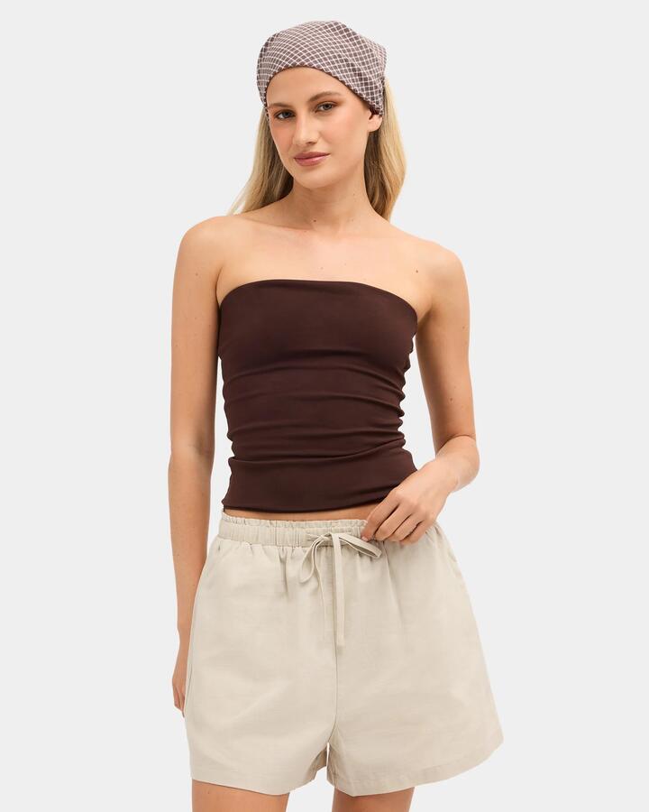 Image of a model wearing Tops. Product name - Nunui Womens Penne Tube Tank Top Chocolate 5 in Chocolate 5 colour by brand - Nunui
