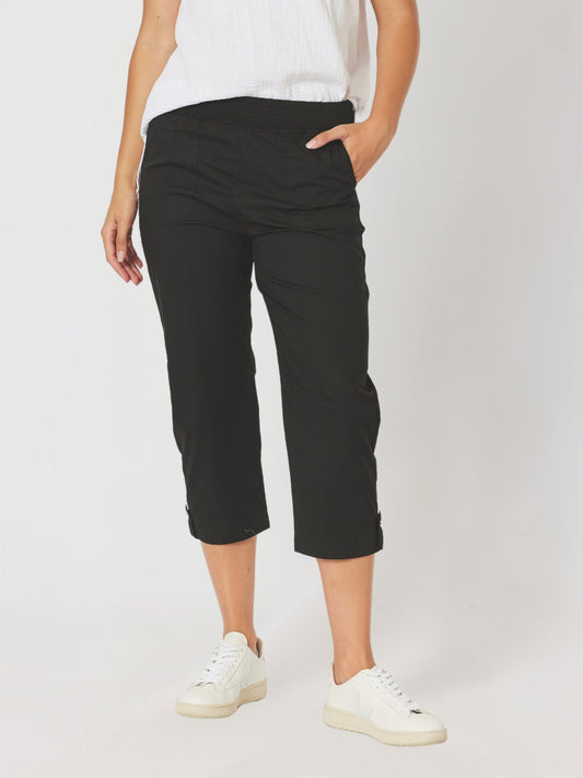 Image of a model wearing Pants. Product name - Santorini Cropped Cotton Pant Black in Black colour by brand - Threadz