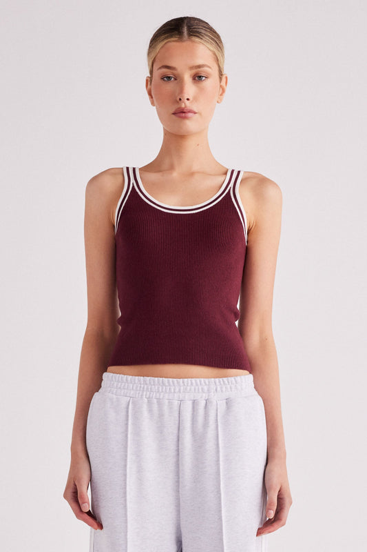 Image of a model wearing Tops. Productname: SNDYS Bex Rib Tank in Cherry colour by brand - SNDYS