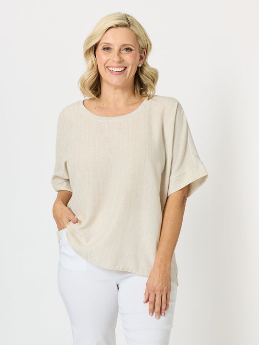 Image of a model wearing Tops. Product name - Riviera Relaxed Stripe Top Natural in Natural colour by brand - Clarity