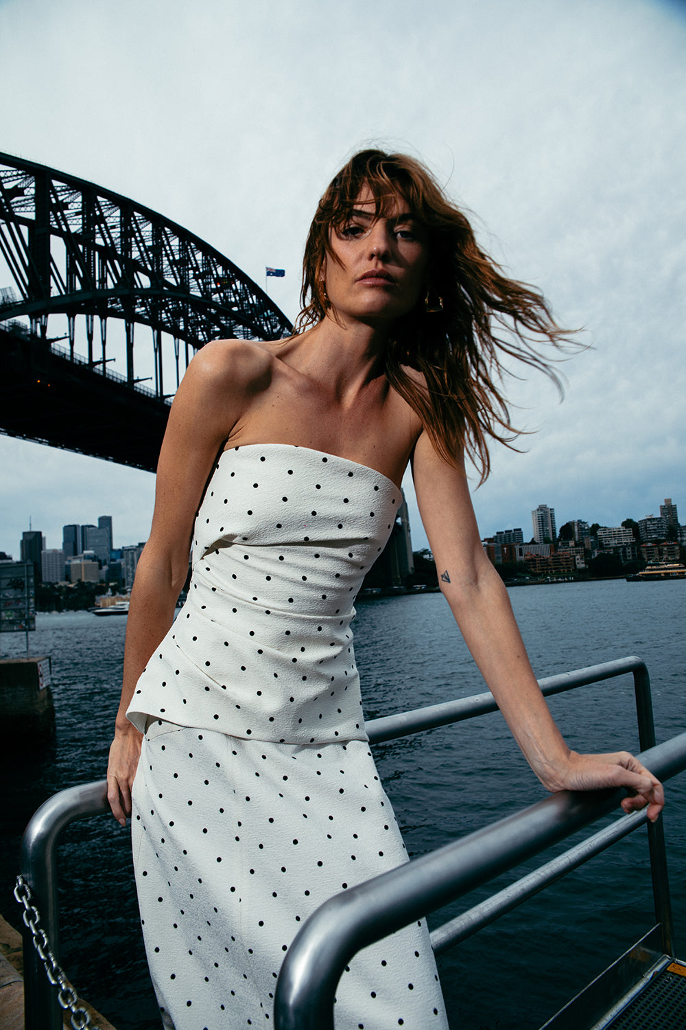 Image of a model wearing Tops. Productname: Dot Dot Dash Bustier in Ivory/Black colour by brand - Manning Cartell