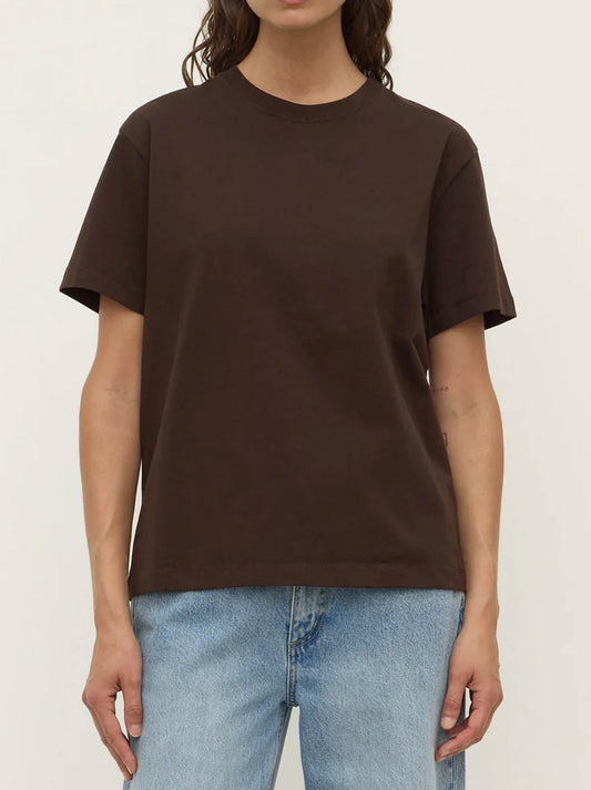 Image of a model wearing Tops. Product name - ASSEMBLY LABEL ORGANIC BASE TEE in Drift colour by brand - Assembly Label