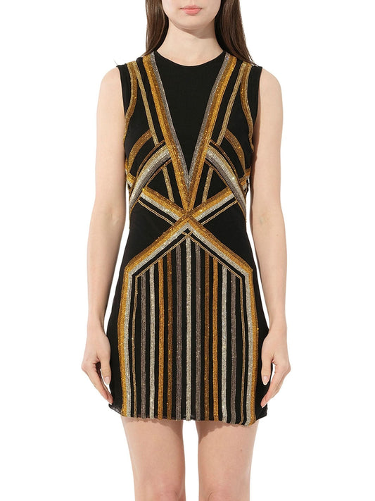 Image of a model wearing Dress. Productname: BALMAIN Dress in Black Gold colour by brand - BALMAIN