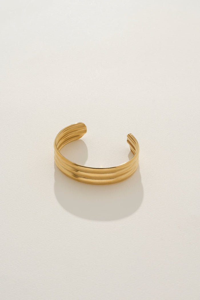 Image of Bracelets. Product name - Aria Bangle in Gold in Gold colour by brand - Reliquia Jewellery