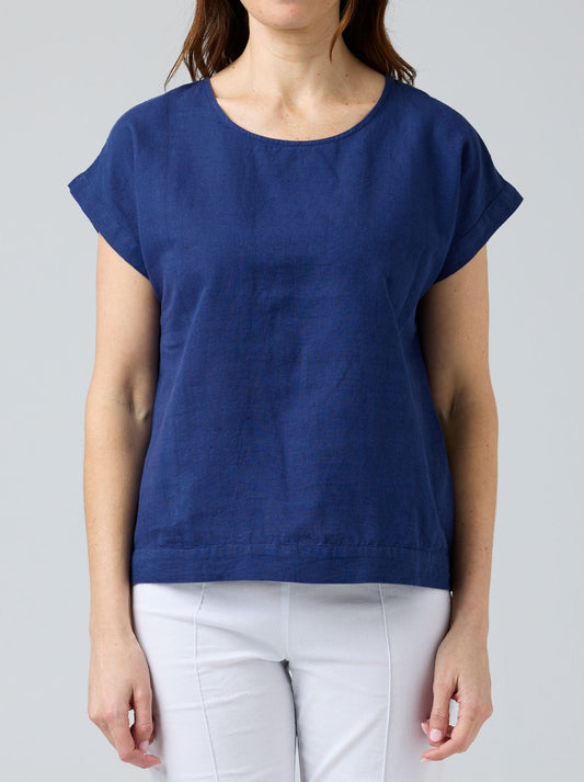 Image of a model wearing Tops. Product name - CAKE VICKY LINEN TOP in Green colour by brand - Cake