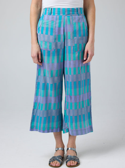 Image of a model wearing Pants. Product name - CAKE ROMY PANT in Blue White Circle colour by brand - Cake