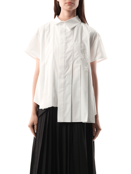 Image of a model wearing Tops. Productname: SACAI Asymmetric Cotton Poplin Shirt in WHITE colour by brand - SACAI
