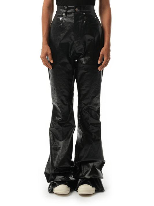 Image of a model wearing Denim. Productname: RICK OWENS Bolan Bootcut Jeans in Black colour by brand - RICK OWENS