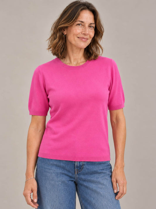 Image of a model wearing Outerwear. Product name - JAMES MELBOURNE SS CREW TEE in Pink colour by brand - James Melbourne