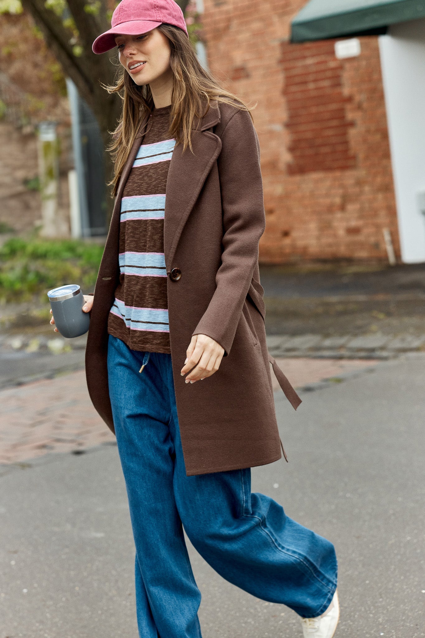 Image of a model wearing Outerwear. Product name - Tahlia Coatigan Nutmeg in Nutmeg colour by brand - Betty Basics