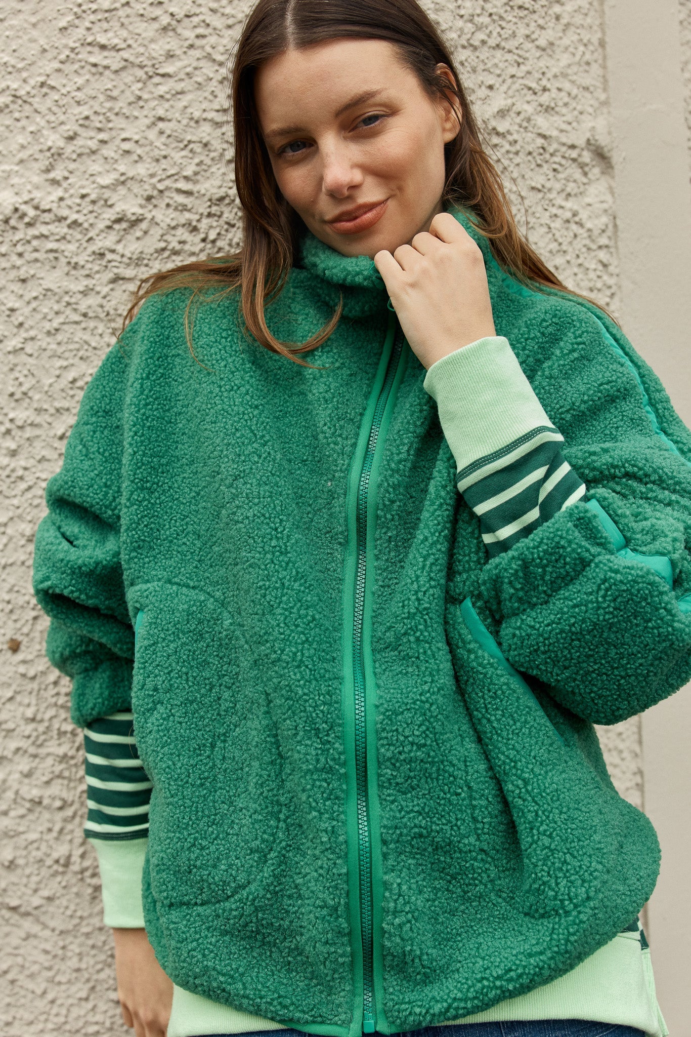 Image of a model wearing Outerwear. Product name - Aubrey Fleece Jacket Green/Dark Green in Green/Dark Green colour by brand - Betty Basics