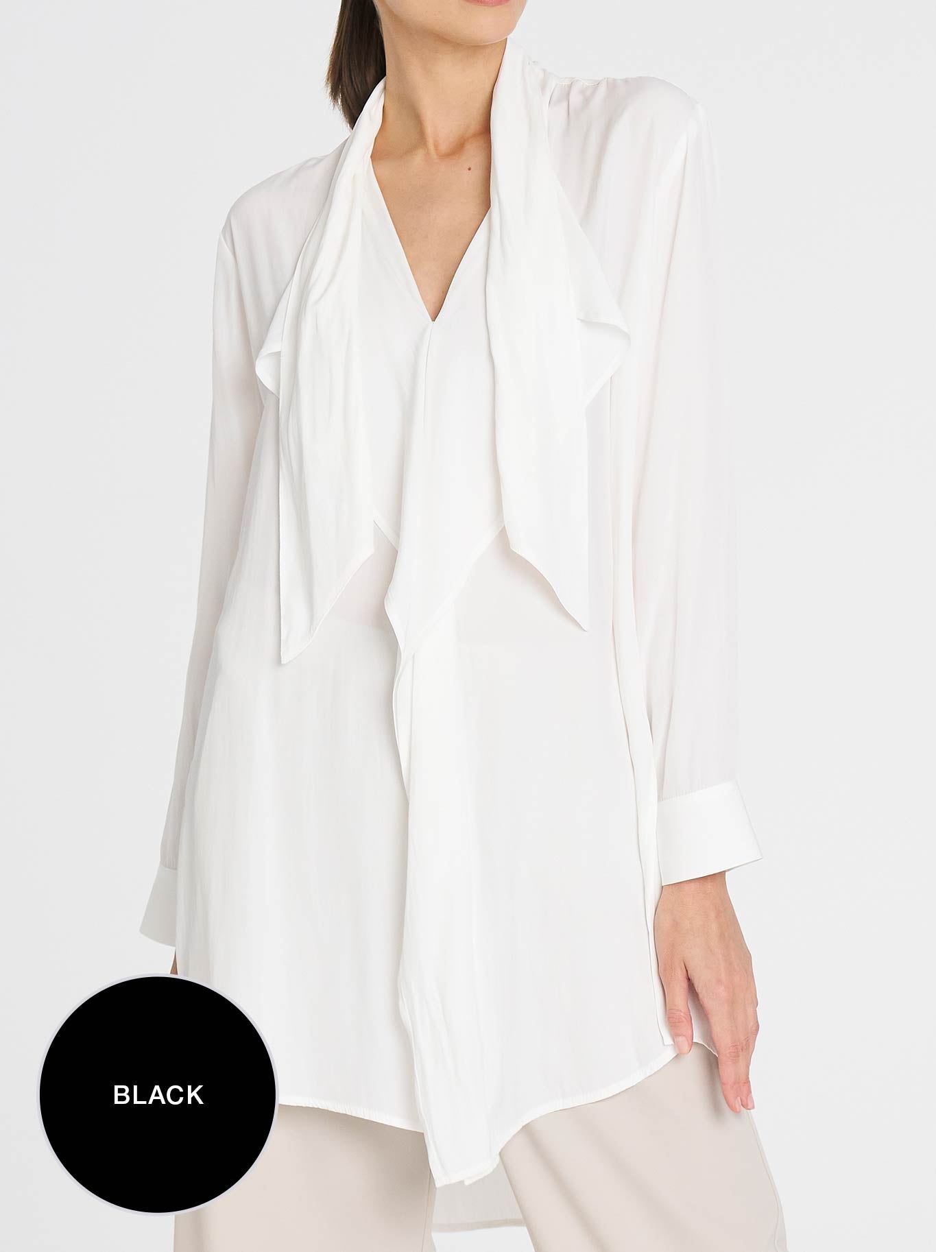 Image of a model wearing Tops. Productname: Mela Purdie Swallow Tunic in Black colour by brand - Mela Purdie