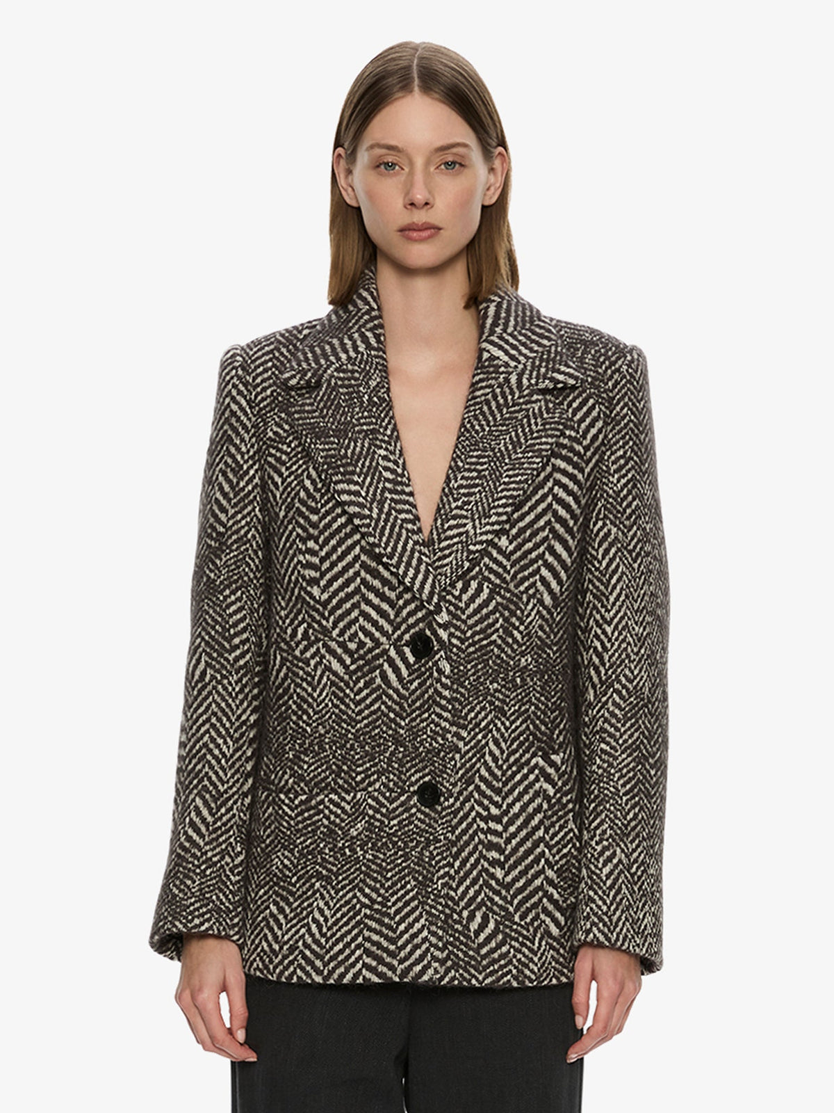 Image of a model wearing Outerwear. Product name - Warped Herringbone Peacoat in White colour by brand - CHRISTOPHER ESBER