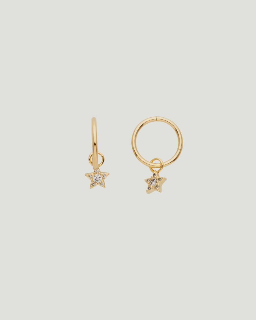 Image of Earrings. Product name - Starry Night Huggies in colour by brand - Reliquia Jewellery