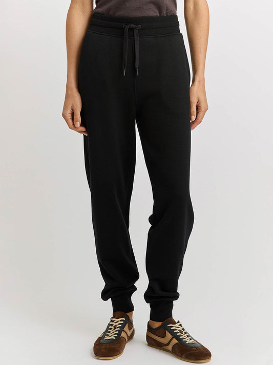 Image of a model wearing Pants. Product name - TOORALLIE LOUNGE DRAWSTRING PANT in Black colour by brand - Toorallie