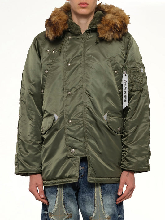 Image of a model wearing Outerwear. Productname: THUG CLUB TC x Alpha Industries N-3B Parka in Sage colour by brand - THUG CLUB