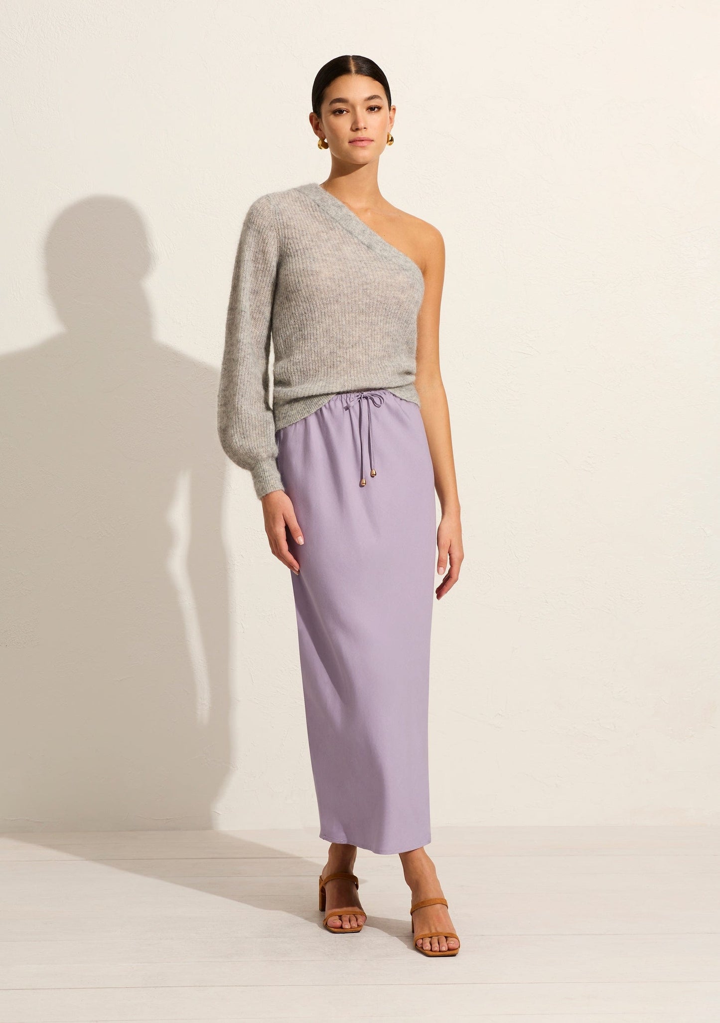 Image of a model wearing Outerwear. Productname: Auguste The Label Alexa Sweater in Print colour by brand - Auguste The Label