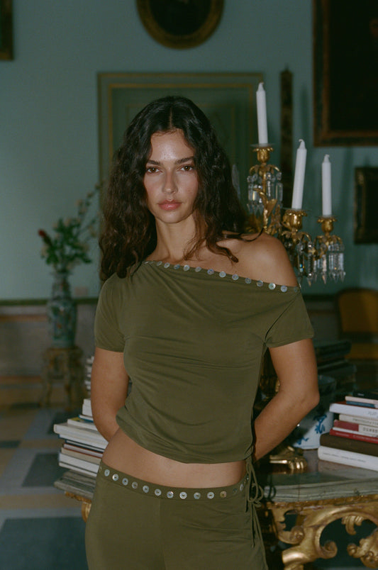 Image of a model wearing Tops. Product name - Benny Top in Khaki colour by brand - With Jéan