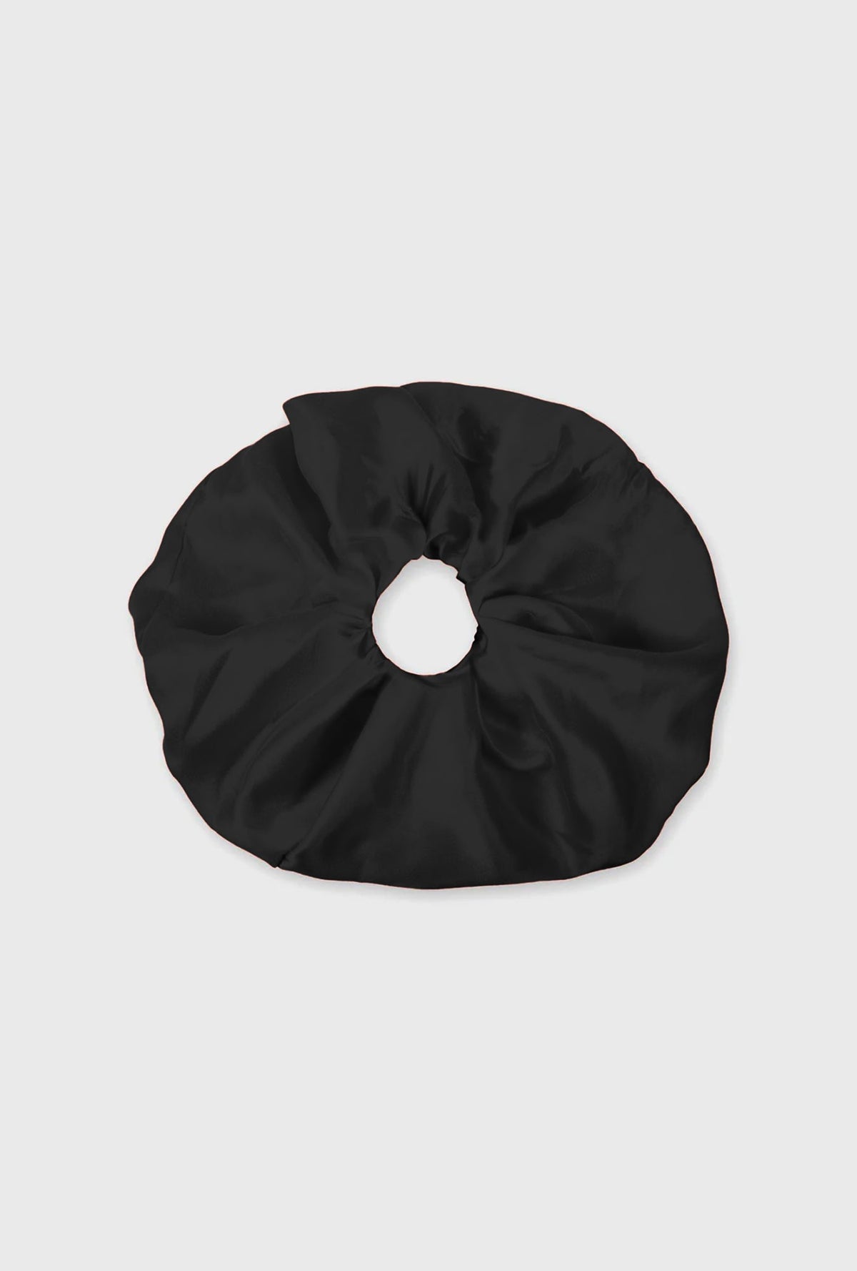 Image of Hair Accessories. Product name - Secret Scrunchie Black in Black colour by brand - Silk Laundry