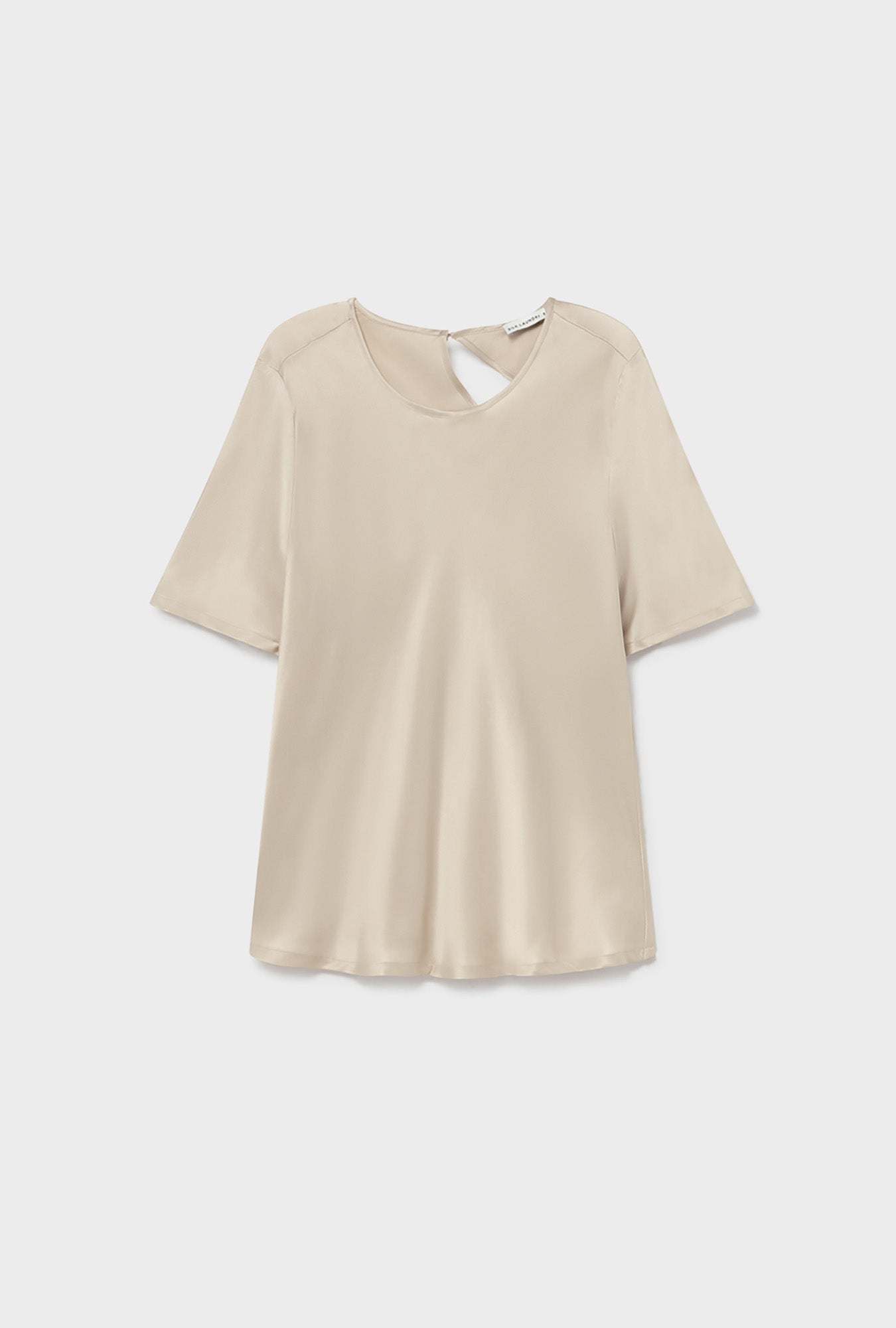 Image of a model wearing Tops. Product name - Short Sleeve Bias Top Hazelnut in Hazelnut colour by brand - Silk Laundry