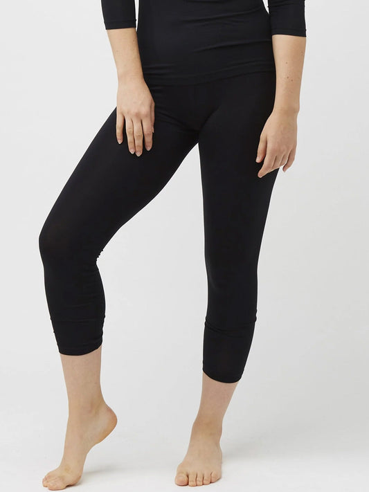 Image of a model wearing Pants. Product name - TANI 7/8TH LEGGINGS in Black colour by brand - Tani