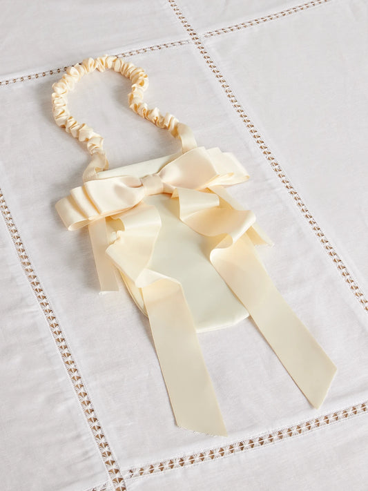 Demi Bow-embellished Satin Baguette Pouch