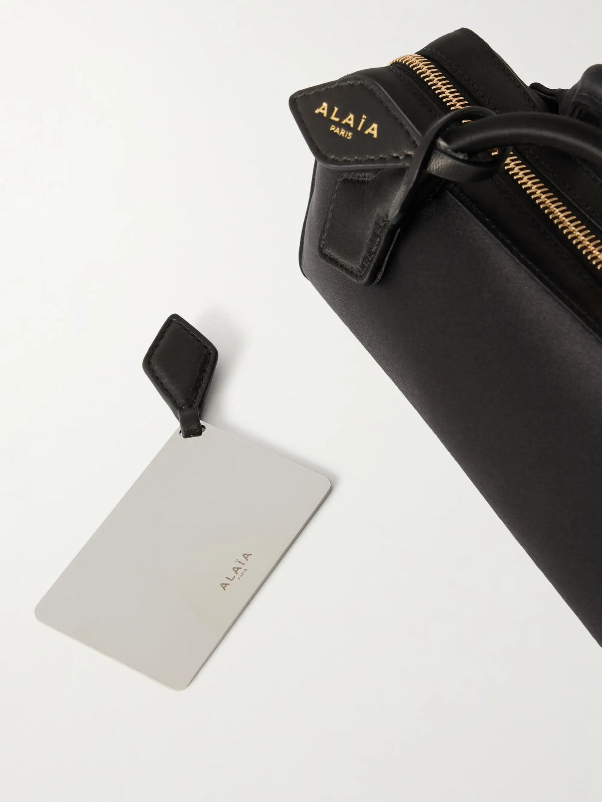 Le Teckle Satin Clutch Bag